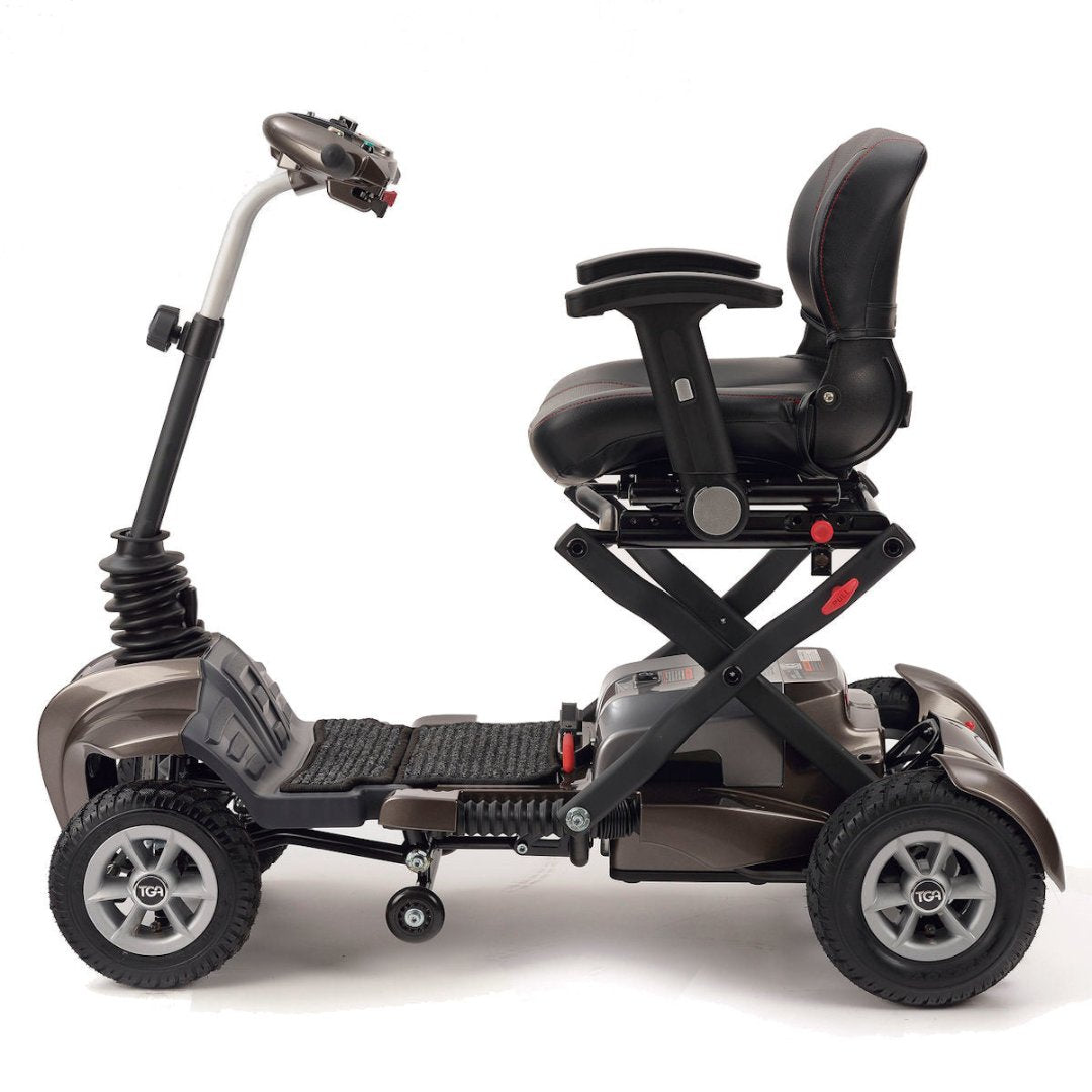 Showing the TGA Maximo Mobility Scooter from a side on view. The scooter is in it's bronze colour.