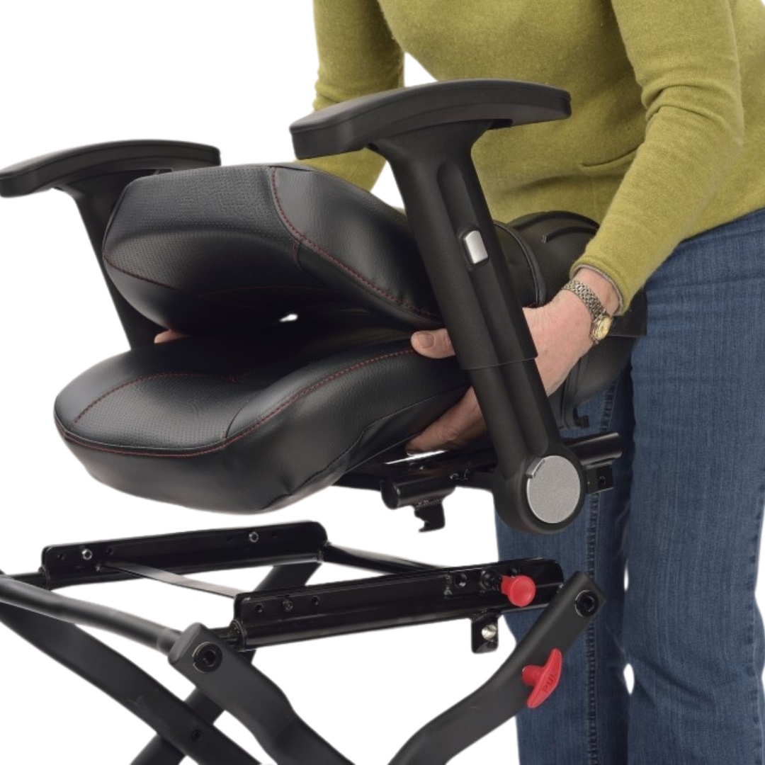 Showing the TGA Maximo Folding Mobility Scooter's seat being removed by the user